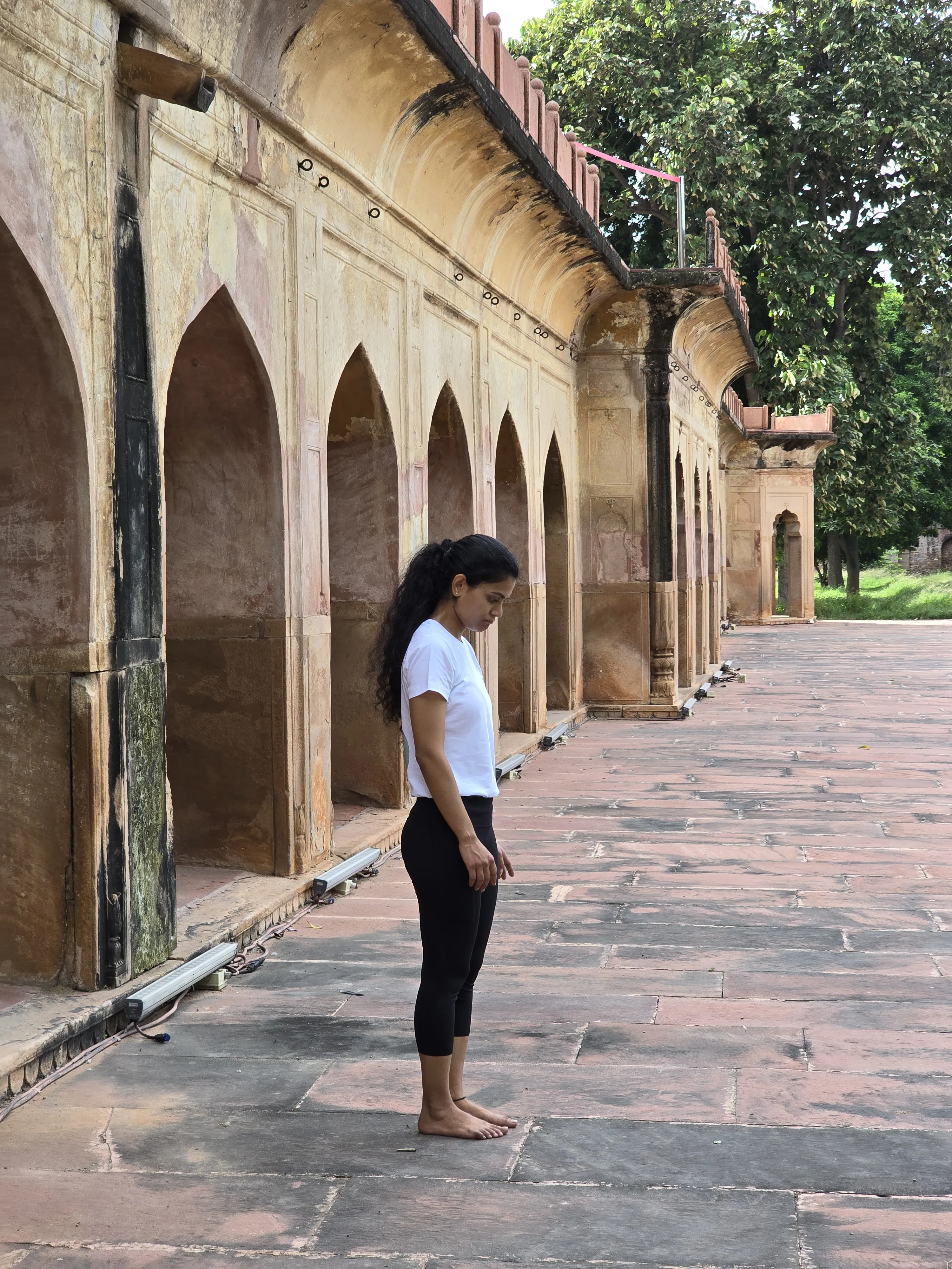 Sakshi in a grounding posture